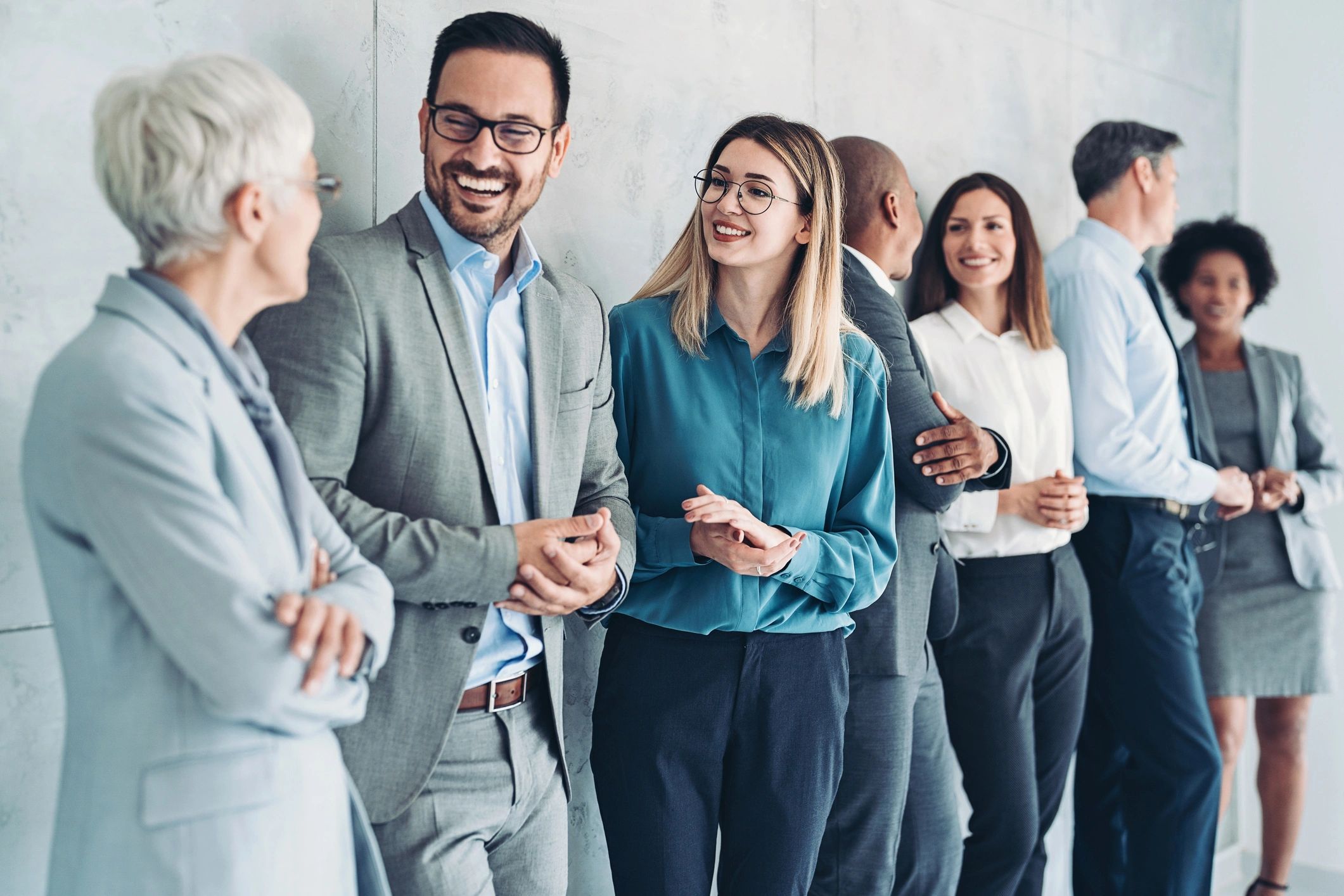 Business professionals standing together at an event
