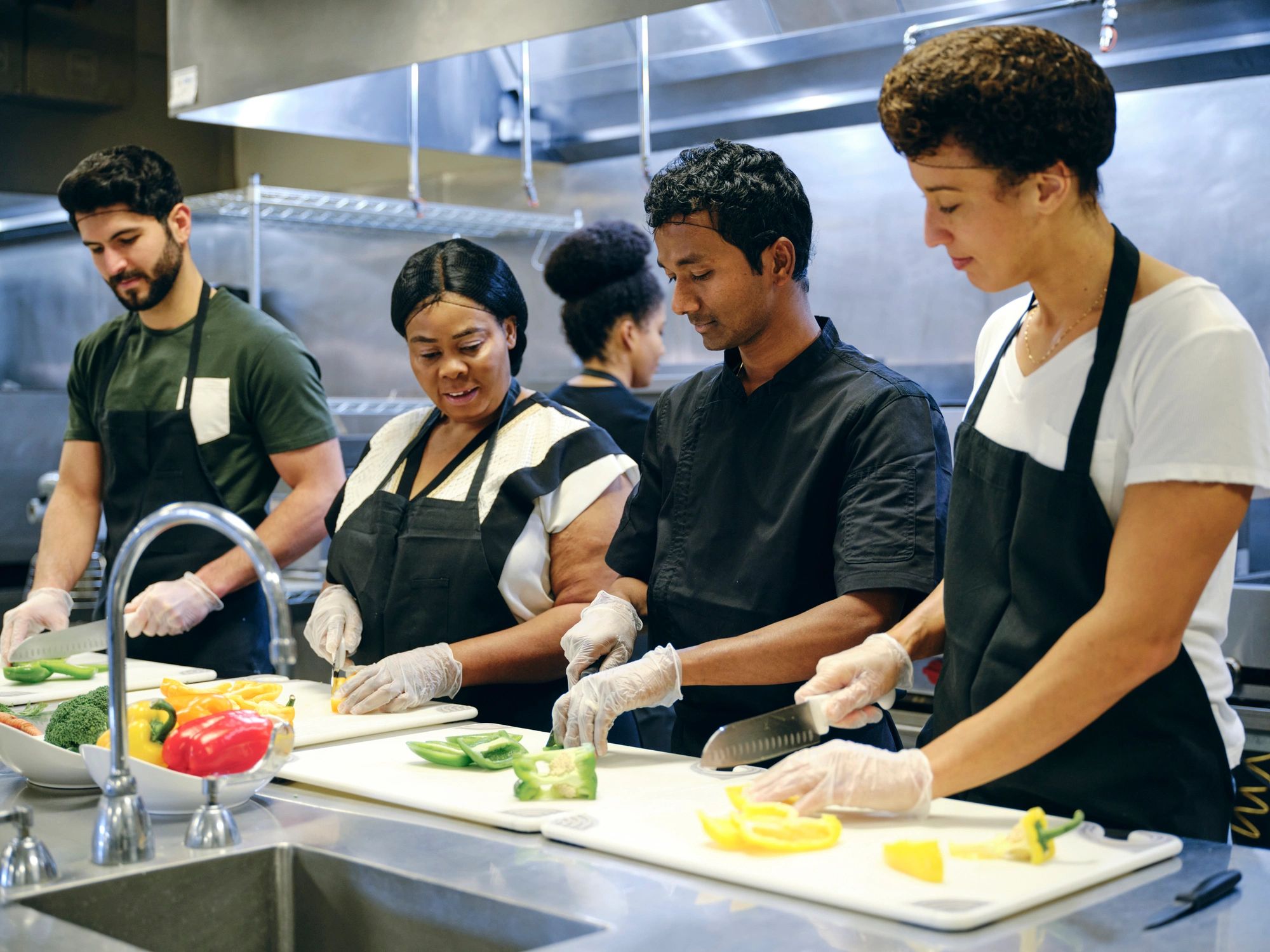 Catering team working together in a commercial kitchen