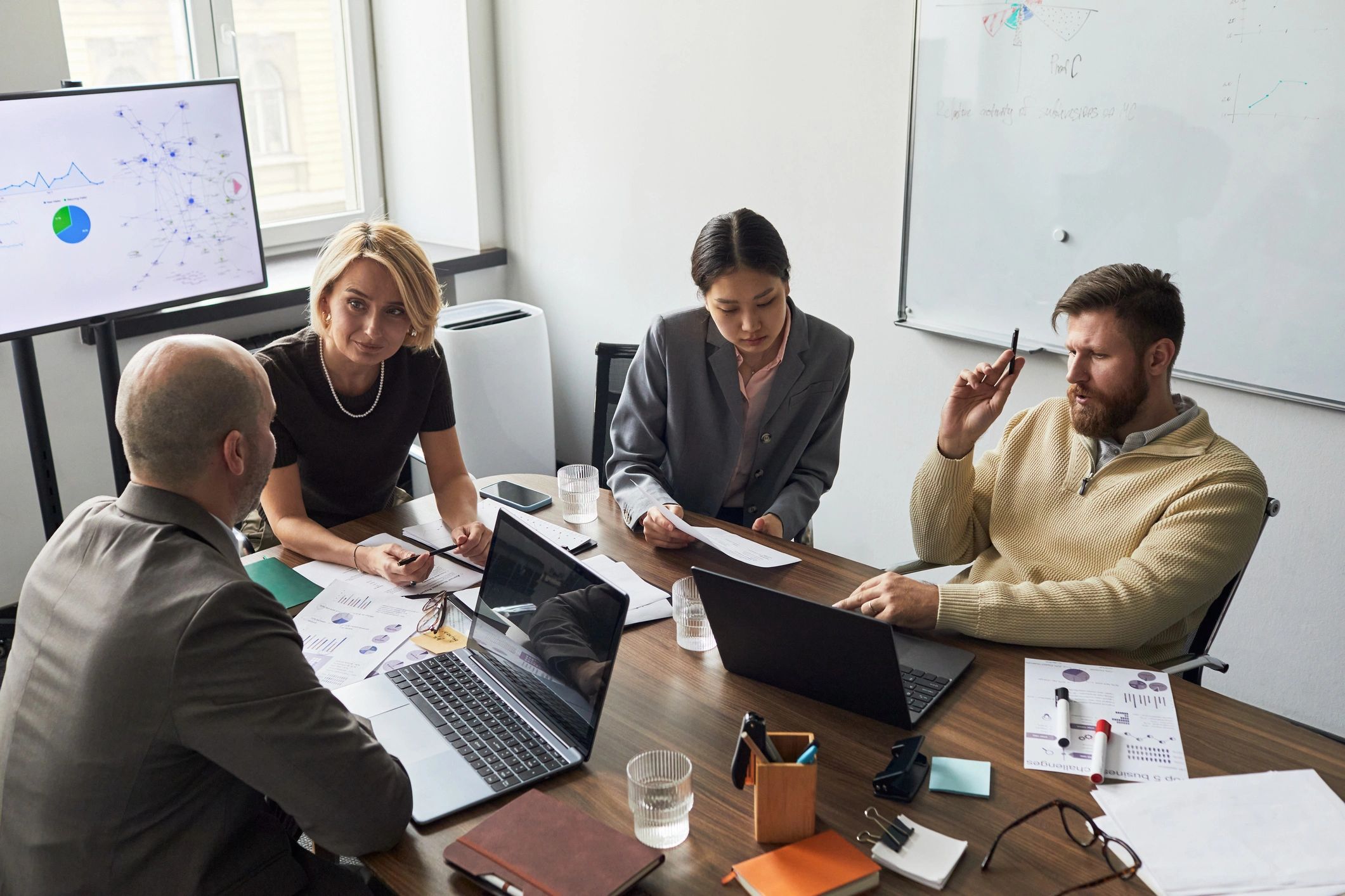 Business team reviewing plans together